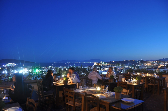 Imagen del bar/restaurante del Hotel El Vino Suites - Special Class. Foto 2