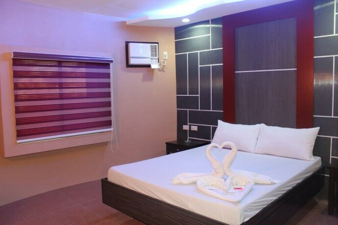 Imagen de la habitación del Hotel El Vistra Travellers Inn and Coffee Shop. Foto 24