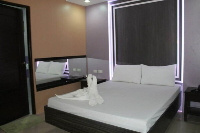 Imagen de la habitación del Hotel El Vistra Travellers Inn and Coffee Shop. Foto 26