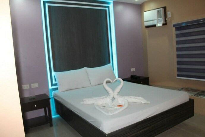 Imagen de la habitación del Hotel El Vistra Travellers Inn and Coffee Shop. Foto 29