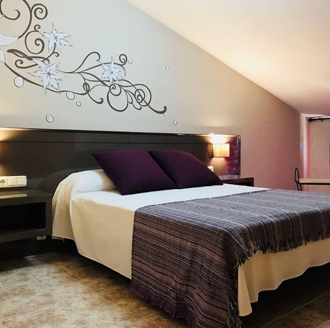 Imagen de la habitación del Hotel El jard&iacute;n de las eras. Foto 8