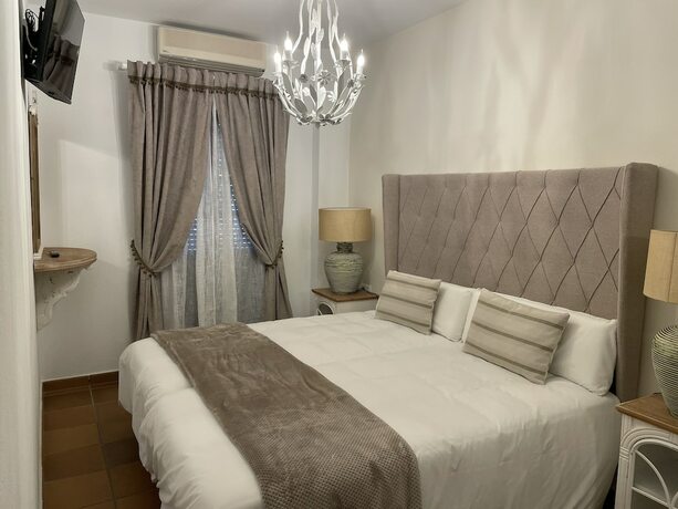 Imagen de la habitación del Hotel El traslado Alojamiento. Foto 11