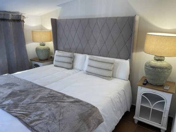 Imagen de la habitación del Hotel El traslado Alojamiento. Foto 14