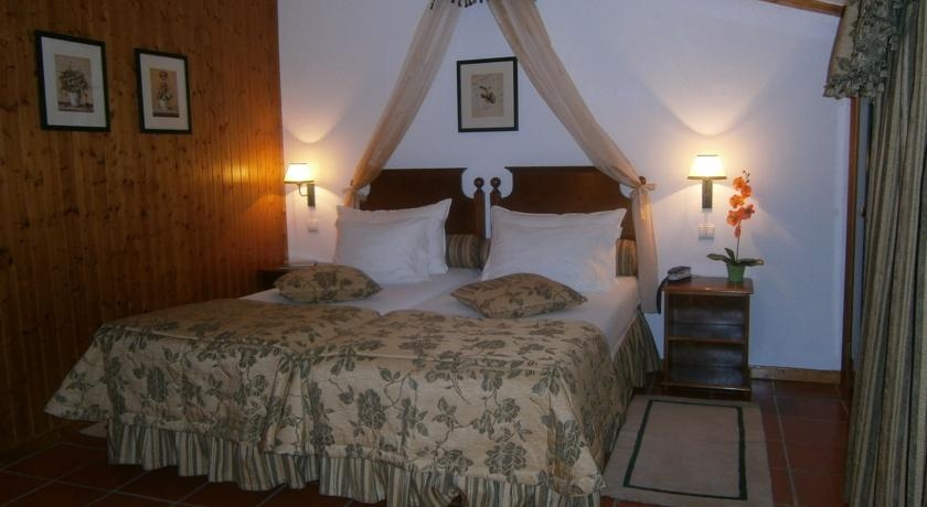 Imagen de la habitación del Hotel El-Rei Dom Manuel. Foto 4
