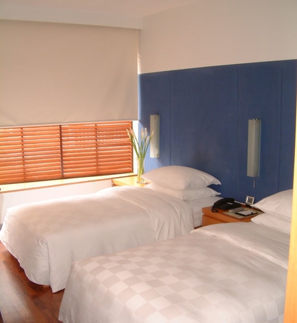 Imagen de la habitación del Hotel Elan Guangzhou. Foto 8