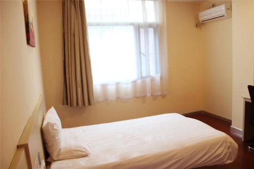 Imagen de la habitación del Hotel Elan Hangzhou Wulinmen South Hushu Road. Foto 8