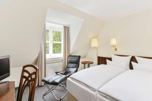 Imagen de la habitación del Hotel Elaya noerdlingen, Trademark by Wyndham. Foto 15