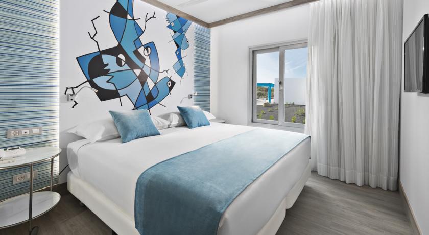 Imagen de la habitación del Hotel Elba Lanzarote Royal Village Resort. Foto 7