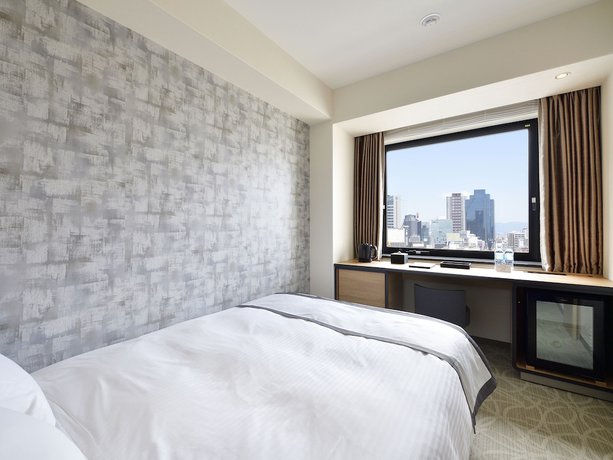 Imagen de la habitación del Hotel Elcient Osaka. Foto 4