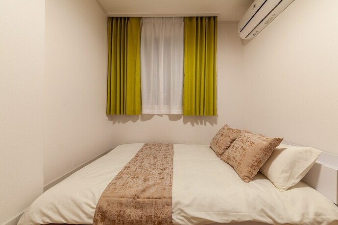 Imagen de la habitación del Hotel Eldor Nishikojiya Apartment. Foto 23