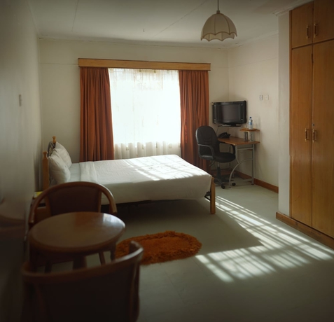Imagen de la habitación del Hotel Eldoret Wagon hotel. Foto 8