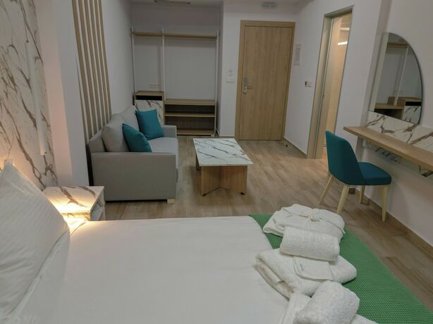 Imagen de la habitación del Hotel Electra Suites. Foto 15