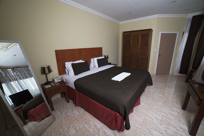 Imagen de la habitación del Hotel Elegance N.V.. Foto 7