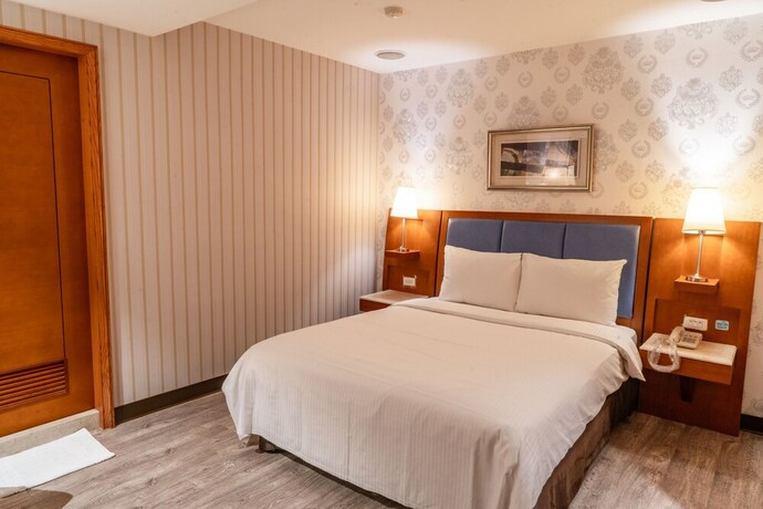 Imagen de la habitación del Hotel Elegance Taipei. Foto 12