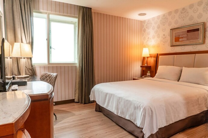 Imagen de la habitación del Hotel Elegance Taipei. Foto 15