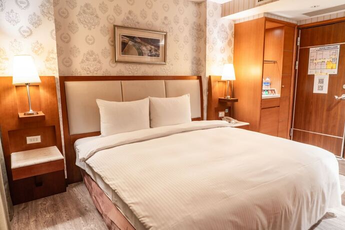 Imagen de la habitación del Hotel Elegance Taipei. Foto 22
