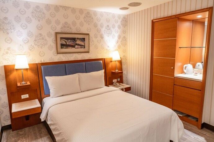 Imagen de la habitación del Hotel Elegance Taipei. Foto 24