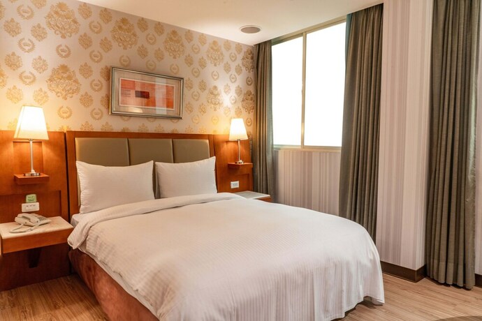 Imagen de la habitación del Hotel Elegance Taipei. Foto 26