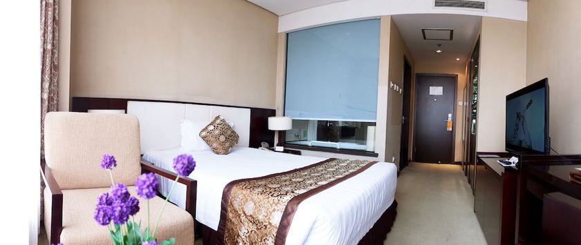 Imagen de la habitación del Hotel Elegance Tianjin. Foto 6
