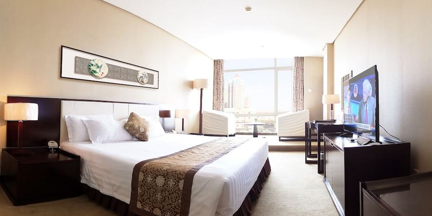 Imagen de la habitación del Hotel Elegance Tianjin. Foto 8