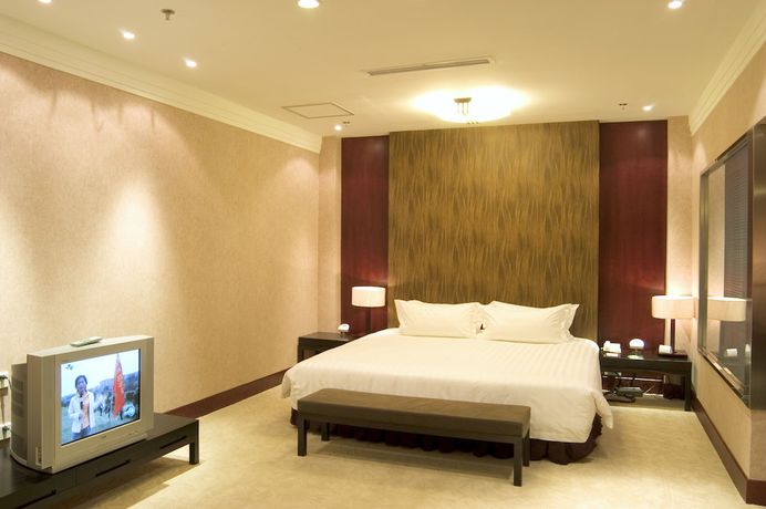 Imagen de la habitación del Hotel Elegance Tianjin. Foto 12