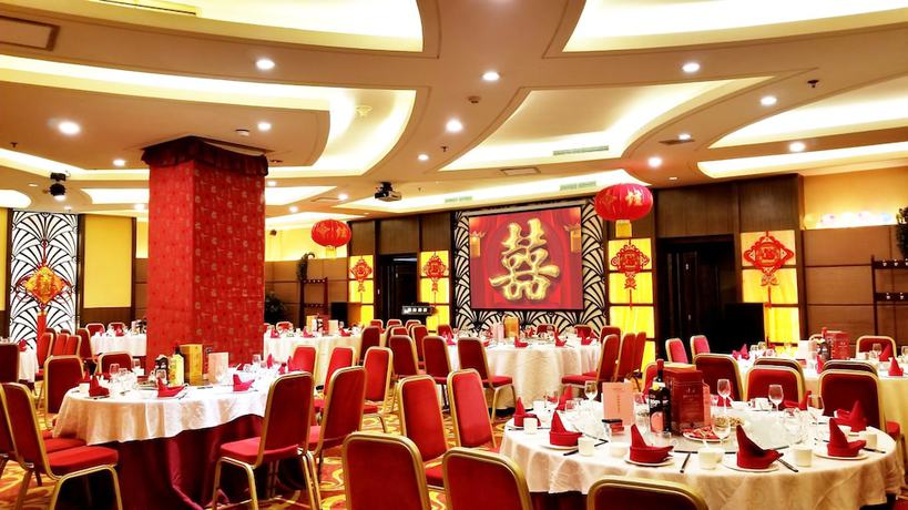 Imagen del bar/restaurante del Hotel Elegance Tianjin. Foto 5