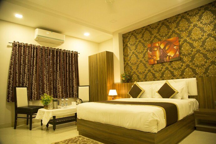 Imagen de la habitación del Hotel Elegance Villa. Foto 17