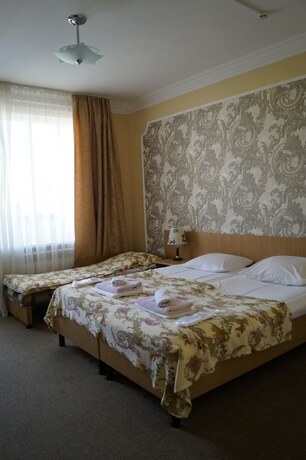 Imagen de la habitación del Hotel Elegant, Mayskiy. Foto 13