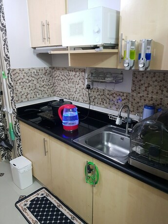 Imagen de la habitación del Hotel Elegant Studio at Grass Residences. Foto 20