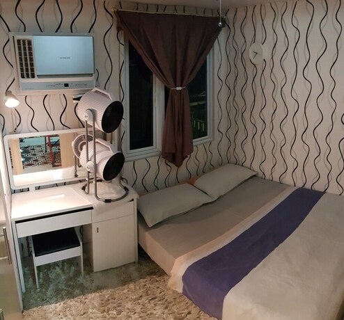 Imagen de la habitación del Hotel Elegant Studio at Grass Residences. Foto 22