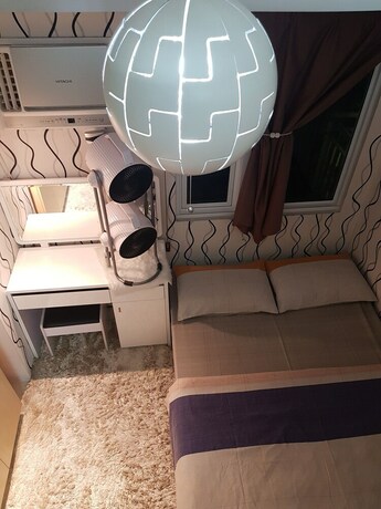 Imagen de la habitación del Hotel Elegant Studio at Grass Residences. Foto 30