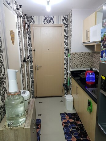 Imagen de la habitación del Hotel Elegant Studio at Grass Residences. Foto 35