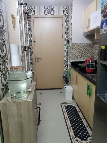 Imagen de la habitación del Hotel Elegant Studio at Grass Residences. Foto 37