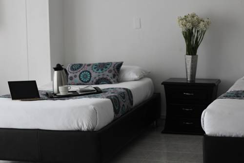 Imagen de la habitación del Hotel Elegant Suite. Foto 5