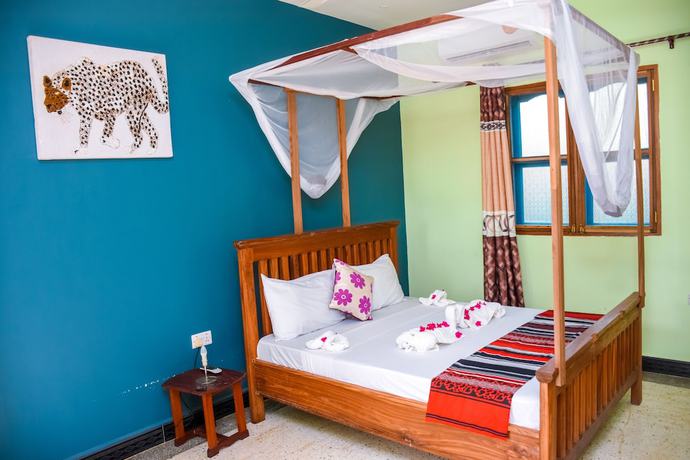 Imagen de la habitación del Hotel Elegante Zanzibar. Foto 2