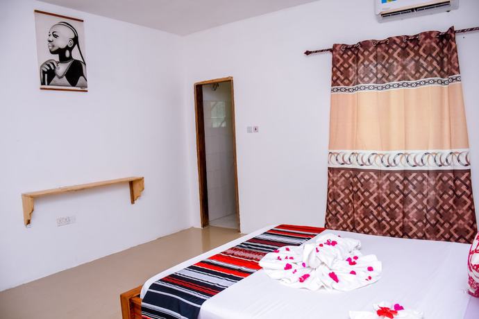 Imagen de la habitación del Hotel Elegante Zanzibar. Foto 13