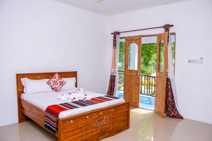 Imagen de la habitación del Hotel Elegante Zanzibar. Foto 16