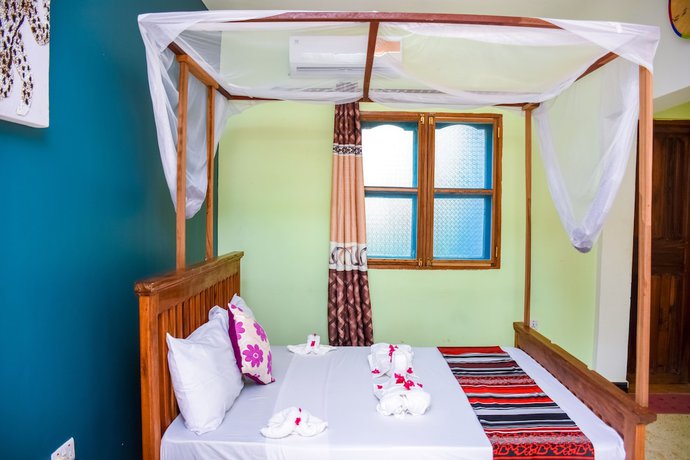 Imagen de la habitación del Hotel Elegante Zanzibar. Foto 18