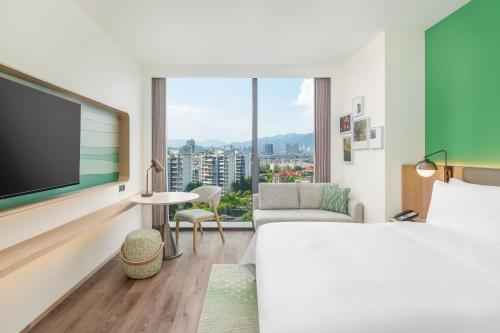 Imagen de la habitación del Hotel Element Lishui. Foto 12