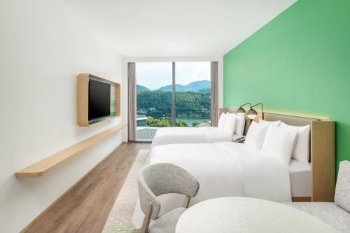 Imagen de la habitación del Hotel Element Lishui. Foto 19