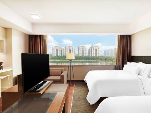 Imagen de la habitación del Hotel Element Suzhou Science And Technology Town. Foto 6
