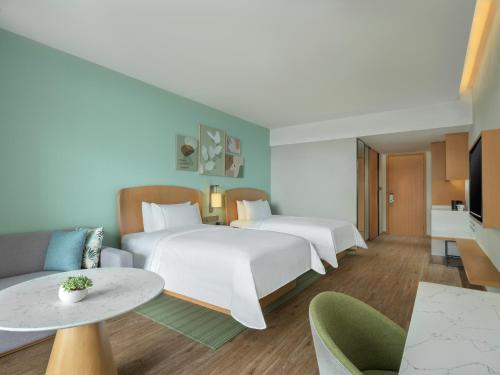 Imagen de la habitación del Hotel Element Yangjiang Hailing Island. Foto 16