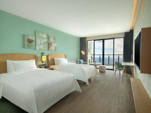 Imagen de la habitación del Hotel Element Yangjiang Hailing Island. Foto 20