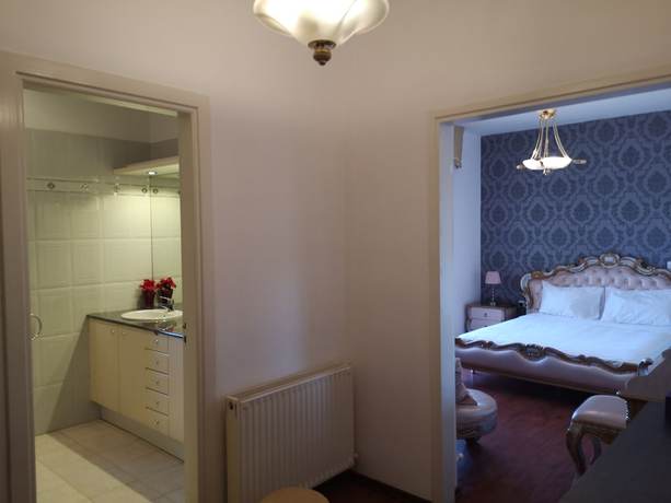 Imagen de la habitación del Hotel Elena Boutique Residence. Foto 16