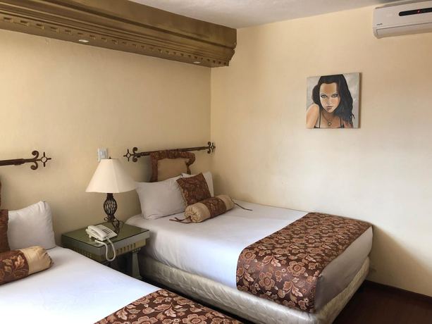 Imagen de la habitación del Hotel Elena, Centro Histórico de Puebla. Foto 2