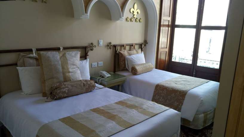 Imagen de la habitación del Hotel Elena, Centro Histórico de Puebla. Foto 10