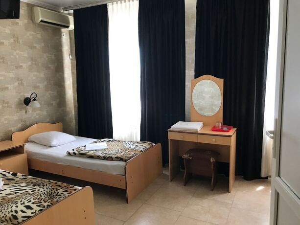 Imagen de la habitación del Hotel Elena Guest House. Foto 18