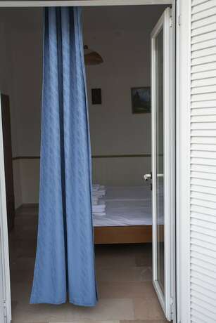 Imagen de la habitación del Hotel Eleni Apartments Sant George Beach. Foto 19