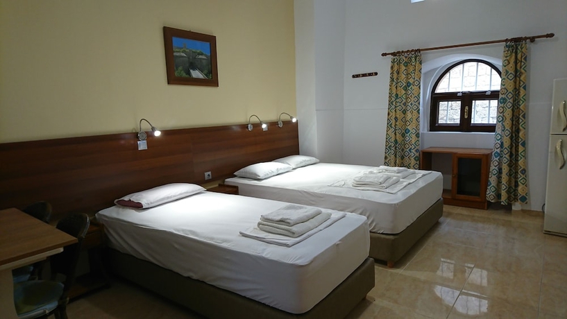 Imagen de la habitación del Hotel Eleni Rooms. Foto 12