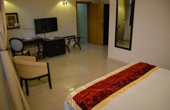 Imagen de la habitación del Hotel Elevate Suites. Foto 19